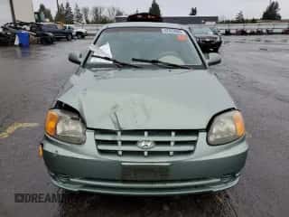 2004 Hyundai Accent GL с VIN KMHCG35C84U303390, выставлен на аукционе Copart как лот 47976065 с пробегом 128 648 миль миль и Списание • Salvage title. История ставок и продаж доступна на DreamBid. Изображение 5.