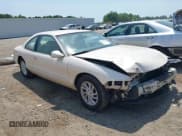 ✅ 1997 Lincoln Mark VIII • VIN: 1LNLM91VXVY630886 • Lot: 42157512. Listed on IAAI with 156,073 mi. Free auction sales archive from the USA and detailed vehicle history report at DreamBid. Image 1.