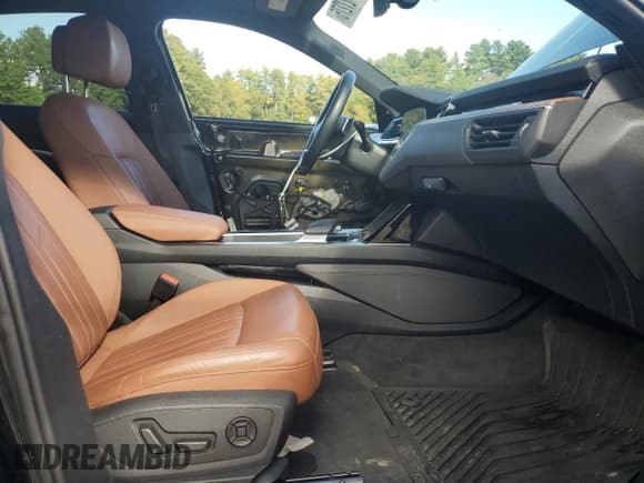 ✅ 2019 Audi e-tron Premium Plus • VIN: WA1LAAGE0KB023197 • Лот: 83927275. Опубликован ранее на Copart с пробегом 77 806 миль. Бесплатный доступ к архиву аукционных продаж из США и подробный отчёт об истории автомобиля на DreamBid. Изображение 7.