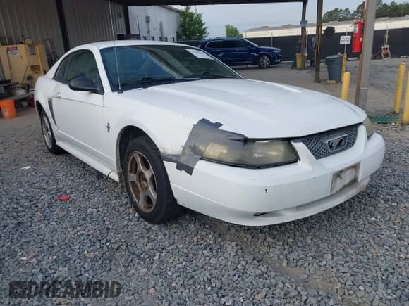 ✅ 2003 Ford Mustang Standard • VIN: 1FAFP404X3F374199 • Lot: 42156866. Listed on IAAI with 224,102 mi. Free auction sales archive from the USA and detailed vehicle history report at DreamBid. Image 1.