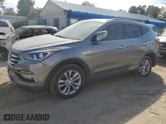 ✅ 2017 Hyundai Santa Fe 2.0T • VIN: 5NMZU4LA5HH041467 • Lot: 81898505. Listed on Copart with 121,360 mi. Free auction sales archive from the USA and detailed vehicle history report at DreamBid. Image 1.