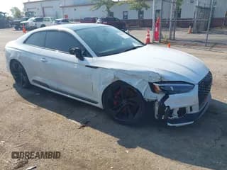 ✅ 2018 Audi RS 5 • VIN: WUAPWAF54JA902140 • Lot: 42996212. Listed on IAAI with 58,697 mi. Free auction sales archive from the USA and detailed vehicle history report at DreamBid. Image 1.