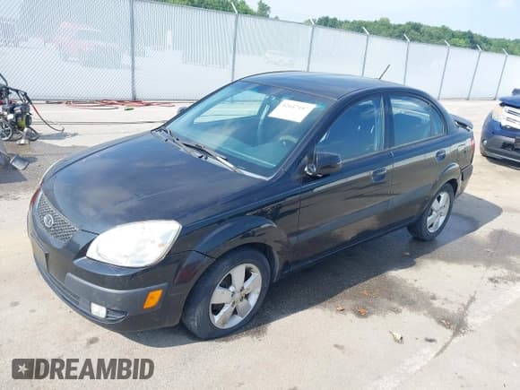 ✅ 2009 Kia Rio LX • VIN: KNADE223496504192 • Lot: 42647197. Listed on IAAI with 131,710 mi. Free auction sales archive from the USA and detailed vehicle history report at DreamBid. Image 2.