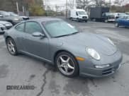 ✅ 2005 Porsche 911 Carrera 997 • VIN: WP0AA29985S716414 • Lot: 43590187. Wystawiony na IAAI z przebiegiem 117 108 mil. Bezpłatny archiwum sprzedaży aukcyjnych z USA i szczegółowy raport historii pojazdu na DreamBid. Zdjęcie 1.