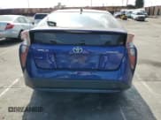 ✅ 2016 Toyota Prius Three Touring • VIN: JTDKARFUXG3503614 • Lot: 90146085. Listed on Copart with 129,132 mi. Free auction sales archive from the USA and detailed vehicle history report at DreamBid. Image 6.