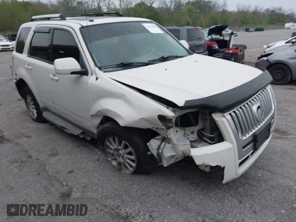 ✅ 2010 Mercury Mariner Premier • VIN: 4M2CN8HG2AKJ06271 • Lot: 41871088. Listed on IAAI with 248,159 mi. Free auction sales archive from the USA and detailed vehicle history report at DreamBid. Image 6.