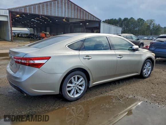 ✅ 2013 Toyota Avalon XLE Premium • VIN: 4T1BK1EB6DU035154 • Lot: 94241995. Listed on Copart with 299,768 mi. Free auction sales archive from the USA and detailed vehicle history report at DreamBid. Image 3.
