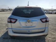 ✅ 2016 Chevrolet Traverse LT • VIN: 1GNKRGKD7GJ347828 • Lot: 71886504. Wystawiony na Copart z przebiegiem 103 237 mil. Bezpłatny archiwum sprzedaży aukcyjnych z USA i szczegółowy raport historii pojazdu na DreamBid. Zdjęcie 6.