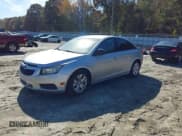 ✅ 2013 Chevrolet Cruze LS • VIN: 1G1PA5SH0D7259573 • Lot: 43613680. Listed on IAAI with 146,199 mi. Free auction sales archive from the USA and detailed vehicle history report at DreamBid. Image 2.