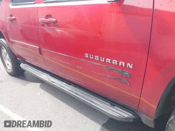 2013 Chevrolet Suburban LT z VIN 1GNSKJE77DR205791, wystawiony jako IAAI lot #43091004 z przebiegiem 184 633 mil mil oraz . Historia ofert i sprzedaży dostępna na DreamBid. Obrazek 17.