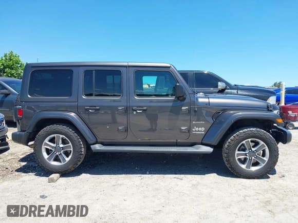 ✅ 2021 Jeep Wrangler Unlimited Sahara • VIN: 1C4HJXEN3MW592235 • Lot: 42690167. Listed on IAAI with 103,351 mi. Free auction sales archive from the USA and detailed vehicle history report at DreamBid. Image 13.