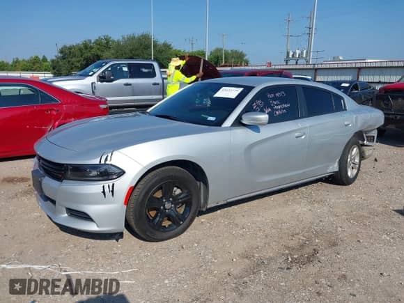 2022 Dodge Charger SXT with VIN 2C3CDXBG6NH231383, listed as a IAAI auction lot 43122779 with 36,162 mi miles and . Bid and sale history available at DreamBid. Image 2.