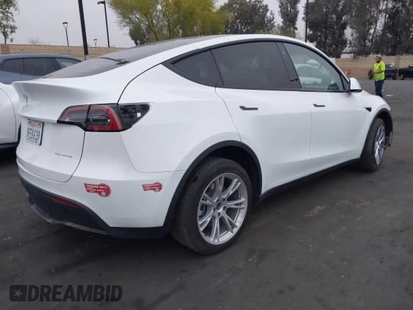 ✅ 2023 Tesla Model Y Long Range • VIN: 7SAYGDEE5PA063097 • Lot: 42171871. Listed on IAAI with Not provided. Free auction sales archive from the USA and detailed vehicle history report at DreamBid. Image 4.