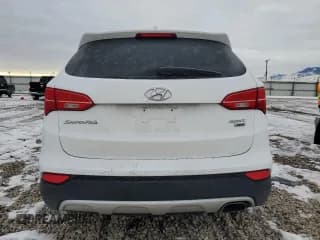 ✅ 2016 Hyundai Santa Fe • VIN: 5XYZTDLB0GG376012 • Лот: 39110784. Опубликован ранее на Copart с пробегом Не указан. Бесплатный доступ к архиву аукционных продаж из США и подробный отчёт об истории автомобиля на DreamBid. Изображение 6.