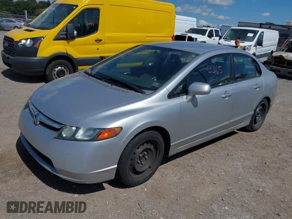 ✅ 2007 Honda Civic LX • VIN: 2HGFA15587H309711 • Лот: 43103365. Опубликован ранее на IAAI с пробегом 178 522 миль. Бесплатный доступ к архиву аукционных продаж из США и подробный отчёт об истории автомобиля на DreamBid. Изображение 2.