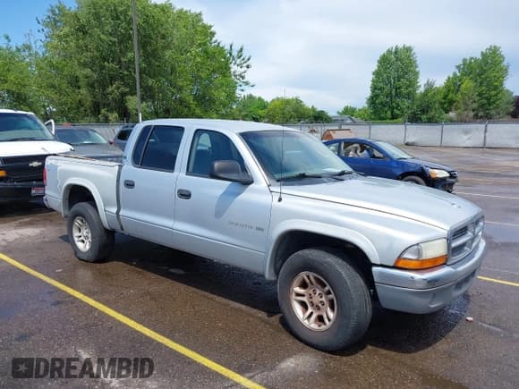 ✅ 2001 Dodge Dakota Sport • VIN: 1B7GG2AX51S167476 • Lot: 42487594. Wystawiony na IAAI z przebiegiem 234 228 mil. Bezpłatny archiwum sprzedaży aukcyjnych z USA i szczegółowy raport historii pojazdu na DreamBid. Zdjęcie 1.
