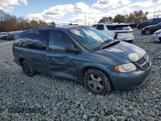 ✅ 2005 Dodge Caravan SXT • VIN: 2D4GP44LX5R219859 • Lot: 90506185. Listed on Copart with 241,981 mi. Free auction sales archive from the USA and detailed vehicle history report at DreamBid. Image 4.