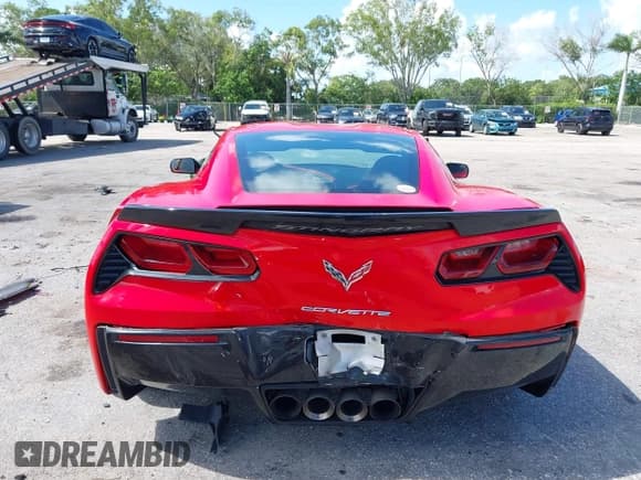 ✅ 2014 Chevrolet Corvette Z51 3LT • VIN: 1G1YL2D79E5130388 • Lot: 42761262. Listed on IAAI with 105,906 mi. Free auction sales archive from the USA and detailed vehicle history report at DreamBid. Image 16.