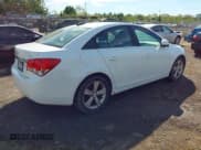 ✅ 2015 Chevrolet Cruze LT • VIN: 1G1PE5SB5F7258227 • Lot: 43460827. Listed on IAAI with 128,271 mi. Free auction sales archive from the USA and detailed vehicle history report at DreamBid. Image 4.