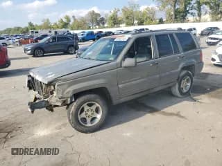 ✅ 1997 Jeep Grand Cherokee Laredo • VIN: 1J4GZ58S2VC544491 • Lot: 82061725. Listed on Copart with Not provided. Free auction sales archive from the USA and detailed vehicle history report at DreamBid. Image 1.