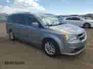 2018 Dodge Grand Caravan SXT z VIN 2C4RDGCGXJR224672, wystawiony jako Copart lot #82143145 z przebiegiem 104 991 mil mil oraz Szkoda całkowita • Salvage title. Historia ofert i sprzedaży dostępna na DreamBid. Obrazek 4.