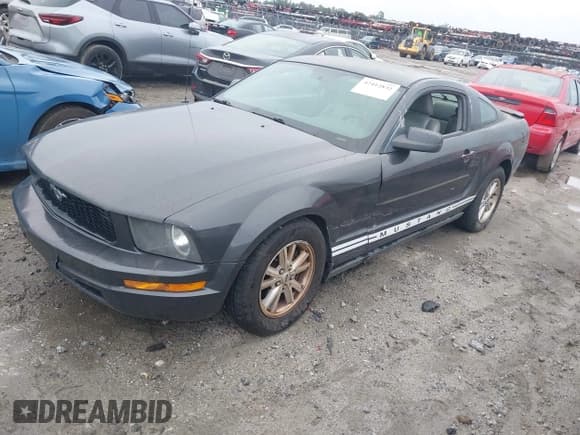 ✅ 2007 Ford Mustang Deluxe • VIN: 1ZVFT80NX75211227 • Lot: 42412832. Listed on IAAI with 166,297 mi. Free auction sales archive from the USA and detailed vehicle history report at DreamBid. Image 2.