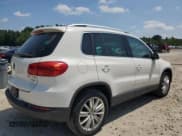 ✅ 2013 Volkswagen Tiguan SE • VIN: WVGBV7AX7DW519222 • Lot: 66412745. Listed on Copart with 212,404 mi. Free auction sales archive from the USA and detailed vehicle history report at DreamBid. Image 3.
