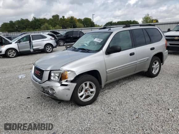 ✅ 2005 GMC Envoy SLE • VIN: 1GKDS13S752189079 • Лот: 71419365. Опубликован ранее на Copart с пробегом 122 219 миль. Бесплатный доступ к архиву аукционных продаж из США и подробный отчёт об истории автомобиля на DreamBid. Изображение 1.