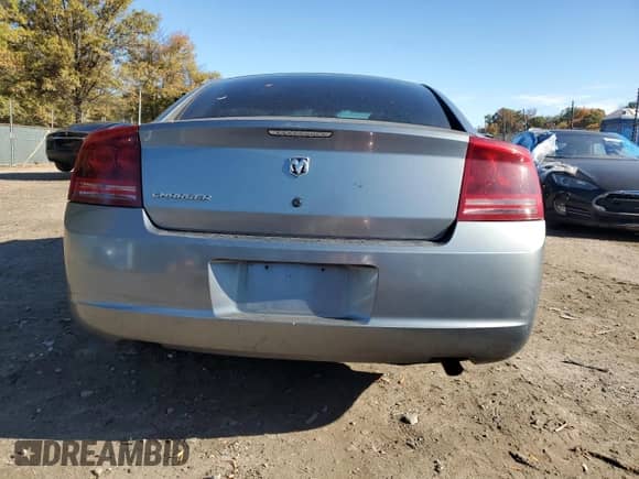2007 Dodge Charger z VIN 2B3KA43RX7H621552, wystawiony jako Copart lot #86513765 z przebiegiem 154 731 mil mil oraz Szkoda całkowita • Salvage title. Historia ofert i sprzedaży dostępna na DreamBid. Obrazek 6.