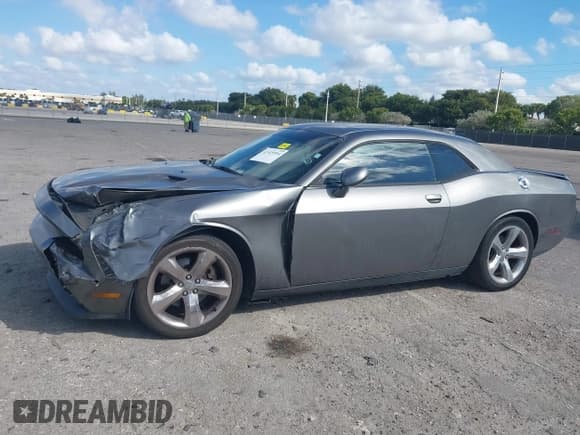 ✅ 2012 Dodge Challenger SXT • VIN: 2C3CDYAG2CH105686 • Lot: 41525994. Wystawiony na IAAI z przebiegiem 130 338 mil. Bezpłatny archiwum sprzedaży aukcyjnych z USA i szczegółowy raport historii pojazdu na DreamBid. Zdjęcie 6.