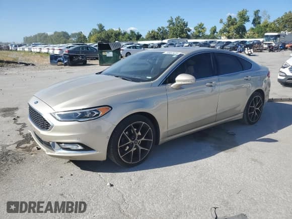 ✅ 2017 Ford Fusion Titanium • VIN: 3FA6P0K98HR348325 • Лот: 70552425. Опубликован ранее на Copart с пробегом 117 432 миль. Бесплатный доступ к архиву аукционных продаж из США и подробный отчёт об истории автомобиля на DreamBid. Изображение 1.