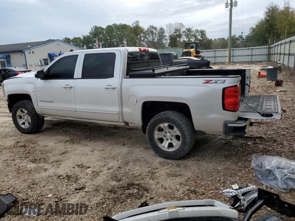 ✅ 2018 Chevrolet Silverado 1500 LT • VIN: 3GCUKREC7JG546231 • Лот: 81651323. Опубликован ранее на Copart с пробегом 130 251 миль. Бесплатный доступ к архиву аукционных продаж из США и подробный отчёт об истории автомобиля на DreamBid. Изображение 2.