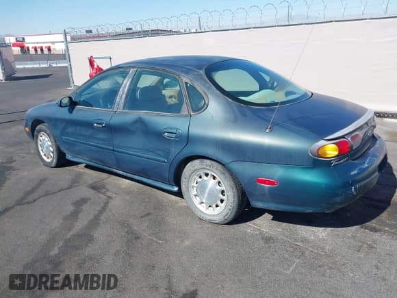 ✅ 1996 Ford Taurus LX • VIN: 1FALP53S0TG125665 • Лот: 42290691. Опубликован ранее на IAAI с пробегом 91 152 миль. Бесплатный доступ к архиву аукционных продаж из США и подробный отчёт об истории автомобиля на DreamBid. Изображение 3.