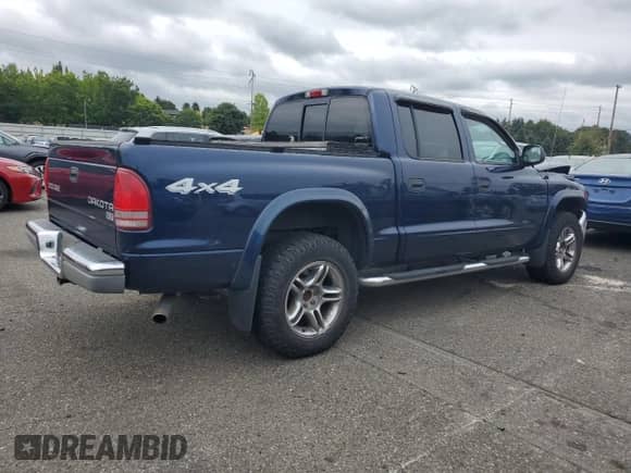 2004 Dodge Dakota SLT z VIN 1D7HG48N94S688652, wystawiony jako Copart lot #71942564 z przebiegiem 141 942 mil mil oraz Szkoda całkowita • Salvage title. Historia ofert i sprzedaży dostępna na DreamBid. Obrazek 3.