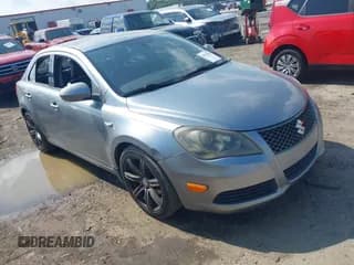 ✅ 2012 Suzuki Kizashi SE • VIN: JS2RE9A38C6100215 • Лот: 42705955. Опубликован ранее на IAAI с пробегом 192 972 миль. Бесплатный доступ к архиву аукционных продаж из США и подробный отчёт об истории автомобиля на DreamBid. Изображение 1.