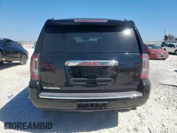 ✅ 2018 GMC Yukon Denali • VIN: 1GKS2CKJ5JR385759 • Lot: 86540985. Listed on Copart with 83,300 mi. Free auction sales archive from the USA and detailed vehicle history report at DreamBid. Image 6.
