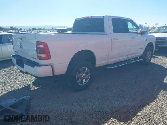 ✅ 2024 Ram 2500 Laramie • VIN: 3C6UR5FL7RG282210 • Lot: 42827990. Listed on IAAI with 18,704 mi. Free auction sales archive from the USA and detailed vehicle history report at DreamBid. Image 4.