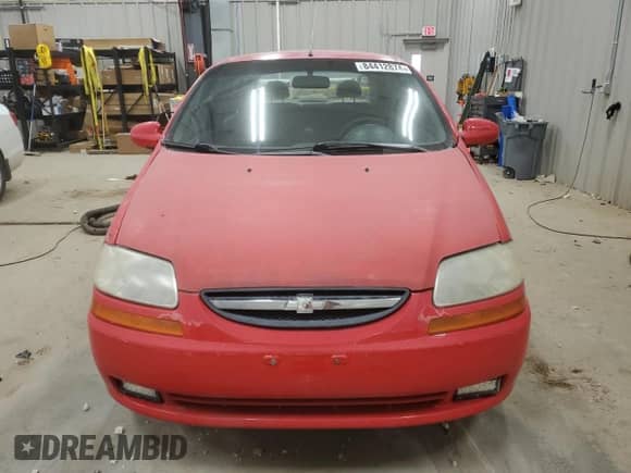 2004 Chevrolet Aveo LS z VIN KL1TJ52614B258568, wystawiony jako Copart lot #84412874 z przebiegiem 150 051 mil mil oraz Czysty tytuł • Clean title. Historia ofert i sprzedaży dostępna na DreamBid. Obrazek 5.