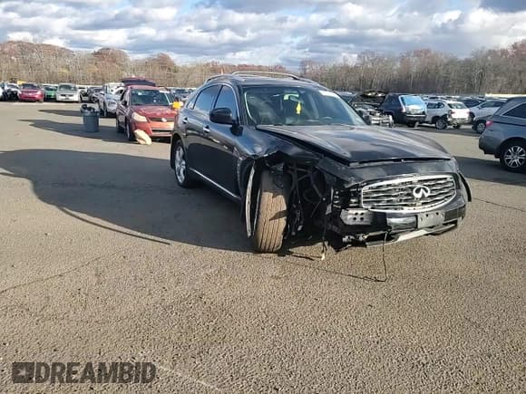 ✅ 2011 Infiniti FX • VIN: JN8AS1MW4BM730593 • Lot: 91601405. Listed on Copart with 127,563 mi. Free auction sales archive from the USA and detailed vehicle history report at DreamBid. Image 13.