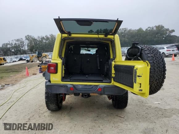✅ 2022 Jeep Wrangler Unlimited High Tide • VIN: 1C4HJXDG8NW242586 • Lot: 42751785. Listed on Copart with 11,476 mi. Free auction sales archive from the USA and detailed vehicle history report at DreamBid. Image 6.