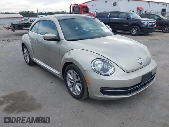✅ 2013 Volkswagen Beetle 2.0L TDI • VIN: 3VWJL7AT7DM690780 • Lot: 41200106. Listed on IAAI with 208,427 mi. Free auction sales archive from the USA and detailed vehicle history report at DreamBid. Image 1.