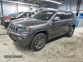 2018 Jeep Grand Cherokee Limited z VIN 1C4RJFBMXJC412708, wystawiony jako Copart lot #89890985 z przebiegiem 134 098 mil mil oraz Czysty tytuł • Clean title. Historia ofert i sprzedaży dostępna na DreamBid. Obrazek 1.