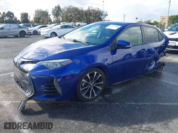 ✅ 2017 Toyota Corolla LE • VIN: 5YFBURHE6HP717196 • Лот: 43737999. Опубликован ранее на IAAI с пробегом 284 184 миль. Бесплатный доступ к архиву аукционных продаж из США и подробный отчёт об истории автомобиля на DreamBid. Изображение 2.