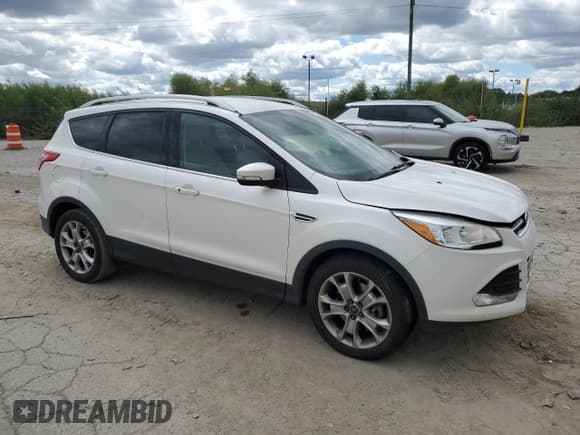 ✅ 2016 Ford Escape Titanium • VIN: 1FMCU0J9XGUA14646 • Lot: 70089815. Listed on Copart with 168,784 mi. Free auction sales archive from the USA and detailed vehicle history report at DreamBid. Image 4.