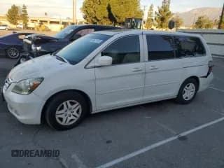 ✅ 2005 Honda Odyssey Touring • VIN: 5FNRL38865B017422 • Lot: 90631125. Listed on Copart with 158,365 mi. Free auction sales archive from the USA and detailed vehicle history report at DreamBid. Image 1.