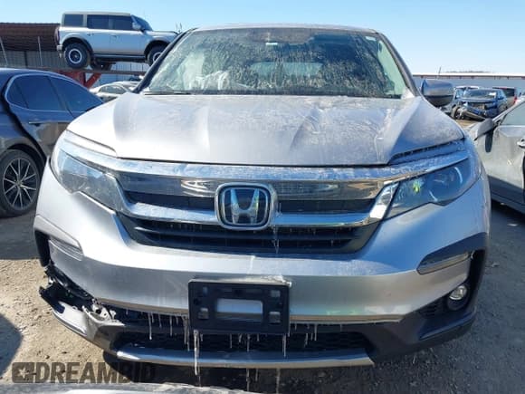 ✅ 2022 Honda Pilot EX-L • VIN: 5FNYF6H54NB018613 • Lot: 41566973. Listed on IAAI with 56,173 mi. Free auction sales archive from the USA and detailed vehicle history report at DreamBid. Image 12.