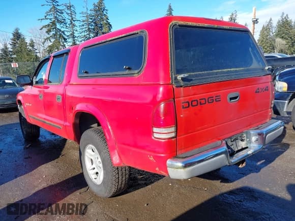 ✅ 2002 Dodge Dakota SLT • VIN: 1B7HG48N62S518157 • Lot: 41471025. Wystawiony na IAAI z przebiegiem 291 644 mil. Bezpłatny archiwum sprzedaży aukcyjnych z USA i szczegółowy raport historii pojazdu na DreamBid. Zdjęcie 3.
