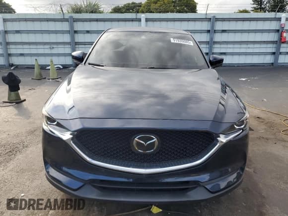 ✅ 2018 Mazda CX-5 Touring • VIN: JM3KFACM6J1448886 • Lot: 91935085. Wystawiony na Copart z przebiegiem 102 177 mil. Bezpłatny archiwum sprzedaży aukcyjnych z USA i szczegółowy raport historii pojazdu na DreamBid. Zdjęcie 5.