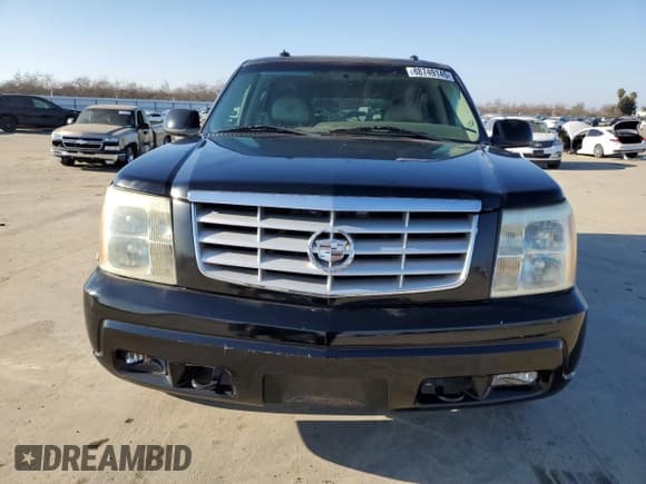 ✅ 2003 Cadillac Escalade • VIN: 1GYEC63T43R157689 • Lot: 88749145. Listed on Copart with 138,905 mi. Free auction sales archive from the USA and detailed vehicle history report at DreamBid. Image 5.