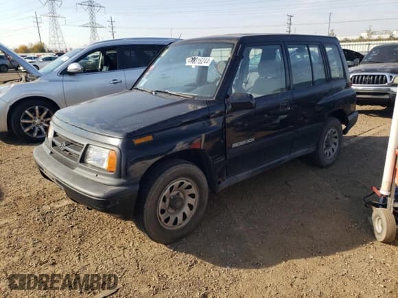✅ 1998 Suzuki Sidekick JS • VIN: 2S3TE02V1W6402490 • Lot: 78316244. Listed on Copart with 79,724 mi. Free auction sales archive from the USA and detailed vehicle history report at DreamBid. Image 1.